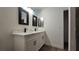 Bathroom features double sink vanity with black fixtures at 2851 S Valley View Blvd # 1098, Las Vegas, NV 89102