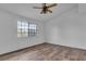 Bedroom featuring a ceiling fan and window providing natural light at 2851 S Valley View Blvd # 1098, Las Vegas, NV 89102