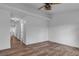 Bright bedroom with hardwood floors and an open view down the hall at 2851 S Valley View Blvd # 1098, Las Vegas, NV 89102