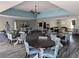 Spacious clubhouse area with tables, chairs, and plenty of seating for community events at 2851 S Valley View Blvd # 1098, Las Vegas, NV 89102