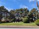 Beautiful green space with trees and manicured hedges offering a tranquil outdoor setting at 2851 S Valley View Blvd # 1098, Las Vegas, NV 89102
