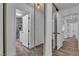 Hallway with mirrored closet doors leading to a bathroom and other rooms at 2851 S Valley View Blvd # 1098, Las Vegas, NV 89102