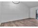 Bright living room features hardwood floors, modern lighting and access to the backyard at 2851 S Valley View Blvd # 1098, Las Vegas, NV 89102