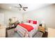 Bedroom featuring carpet, a ceiling fan, window, and neutral walls at 7119 Saddle Back Peak St, Las Vegas, NV 89166