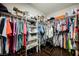 Walk-in closet with hanging rods, shelving and plenty of storage space for clothing and accessories at 7119 Saddle Back Peak St, Las Vegas, NV 89166