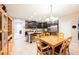 Bright eat-in kitchen features an island with granite countertop and stainless steel appliances at 7119 Saddle Back Peak St, Las Vegas, NV 89166