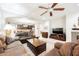 Bright, open living room showcasing comfortable seating and an open flow to the kitchen at 7119 Saddle Back Peak St, Las Vegas, NV 89166