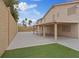 Backyard with a covered patio and a privacy wall at 7711 Lofty Hill Ct, Las Vegas, NV 89123