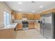 This kitchen boasts granite countertops, stainless steel appliances, and ample cabinet space at 7711 Lofty Hill Ct, Las Vegas, NV 89123