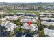 Wonderful aerial view of a property surrounded by lush greenery and fairways in a desirable golf community at 900 Domnus Ln # 102, Las Vegas, NV 89144