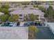 Beautiful multi-Gathering unit featuring ample parking, a well-maintained exterior, and private balconies at 900 Domnus Ln # 102, Las Vegas, NV 89144