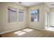 Bright bedroom with a sliding glass door and tile flooring at 1024 Larkspur Point Ct, Las Vegas, NV 89138