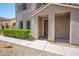 Inviting home exterior featuring a covered porch and well-kept landscaping at 1024 Larkspur Point Ct, Las Vegas, NV 89138