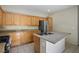 A bright, open kitchen with modern stainless steel appliances and granite countertops at 1024 Larkspur Point Ct, Las Vegas, NV 89138