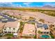 Beautiful aerial view of suburban homes featuring well-maintained landscaping at 1172 Via Della Costrella, Henderson, NV 89011