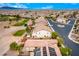 Expansive aerial view of a neighborhood near a golf course at 1172 Via Della Costrella, Henderson, NV 89011