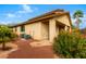 View of the backyard with desert landscaping and covered patio at 1172 Via Della Costrella, Henderson, NV 89011