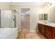 En-suite bathroom with a soaking tub, a shower, and double sinks for a luxurious experience at 1172 Via Della Costrella, Henderson, NV 89011