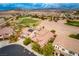 Scenic view of a charming neighborhood with a golf course, surrounded by mountains at 1172 Via Della Costrella, Henderson, NV 89011