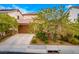 Charming single-Gathering home with a two-car garage and desert landscaping at 1172 Via Della Costrella, Henderson, NV 89011