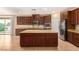 Gourmet kitchen with granite counters and stainless steel appliances at 1172 Via Della Costrella, Henderson, NV 89011