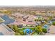 Aerial view of the community and the home featuring a backyard with a pool and basketball court at 12119 Castilla Rain Ave, Las Vegas, NV 89138