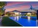 Backyard basketball court with home in background and covered patio at 12119 Castilla Rain Ave, Las Vegas, NV 89138