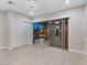 A bonus room features tile floors, recessed lights and a sliding door to the outdoor living space at 12119 Castilla Rain Ave, Las Vegas, NV 89138