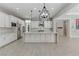 Bright, open kitchen featuring an oversized island, modern stainless appliances, and lots of counter space at 12119 Castilla Rain Ave, Las Vegas, NV 89138