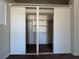 A walk in closet with closet organizer and carpeted floor at 1474 Santa Anita Dr # B, Las Vegas, NV 89119