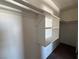 A closet featuring built in shelves and hanging racks at 1474 Santa Anita Dr # B, Las Vegas, NV 89119