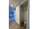 Hallway closet leading to a laundry room with a washing machine and dryer at 1474 Santa Anita Dr # B, Las Vegas, NV 89119