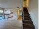 Open-concept living space leading to the kitchen and stairs to the upper level at 1474 Santa Anita Dr # B, Las Vegas, NV 89119
