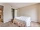 Bedroom with a double mattress bed, closet with sliding doors and neutral wall color at 1575 W Warm Springs Rd # 121, Henderson, NV 89014