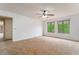 Bedroom showcasing carpeting and natural light at 1575 W Warm Springs Rd # 121, Henderson, NV 89014