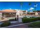 Community pool and spa area surrounded by desert landscaping and apartment buildings at 1575 W Warm Springs Rd # 121, Henderson, NV 89014
