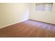 Bedroom featuring neutral walls, wall-to-wall carpeting, and a window with horizontal blinds at 212 Orland St # 17, Las Vegas, NV 89107