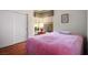 Bright bedroom featuring wood floors, and a neutral color scheme at 2137 Point Mallard Dr, Henderson, NV 89012