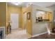 Welcoming foyer featuring neutral paint, tile flooring, and an open view to the kitchen, creating a warm entry at 2137 Point Mallard Dr, Henderson, NV 89012