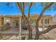 Backyard patio boasts solar panels, covered seating, and a grill area at 2213 Carrier Dove Way, North Las Vegas, NV 89084