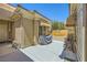 Relaxing backyard patio featuring comfortable seating and shaded areas for outdoor enjoyment at 2213 Carrier Dove Way, North Las Vegas, NV 89084