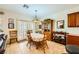 Cozy dining area with vintage furniture, adjoining the living area and featuring ample natural light at 2213 Carrier Dove Way, North Las Vegas, NV 89084