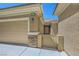 Lovely single-story home featuring rock landscaping, a neutral color, and an attached two-car garage at 2213 Carrier Dove Way, North Las Vegas, NV 89084