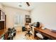 A well-organized home office offers plenty of storage and natural light at 2213 Carrier Dove Way, North Las Vegas, NV 89084