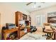 The home office is furnished with custom cabinets and offers great natural light at 2213 Carrier Dove Way, North Las Vegas, NV 89084