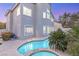 Backyard pool and spa with lush landscaping at 2236 Timber Rose Dr, Las Vegas, NV 89134