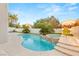 Inviting backyard pool with waterfall feature, spa, and ample patio space at 2236 Timber Rose Dr, Las Vegas, NV 89134