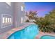 Sparkling pool and spa in a private backyard oasis at 2236 Timber Rose Dr, Las Vegas, NV 89134