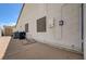 House exterior featuring a basketball hoop alongside a storage unit and air conditioning at 2301 Jean Paul Ave, North Las Vegas, NV 89031