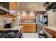 Kitchen featuring stainless steel appliances and wooden cabinets at 2301 Jean Paul Ave, North Las Vegas, NV 89031